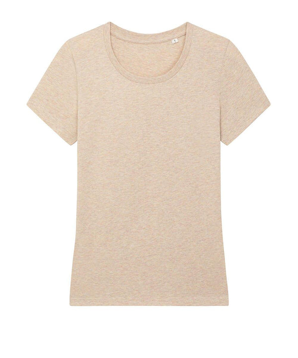 A plain, short-sleeved crew neck T-shirt in a light peach or beige colour is laid flat on a white background, with no visible patterns, logos, or embellishments.