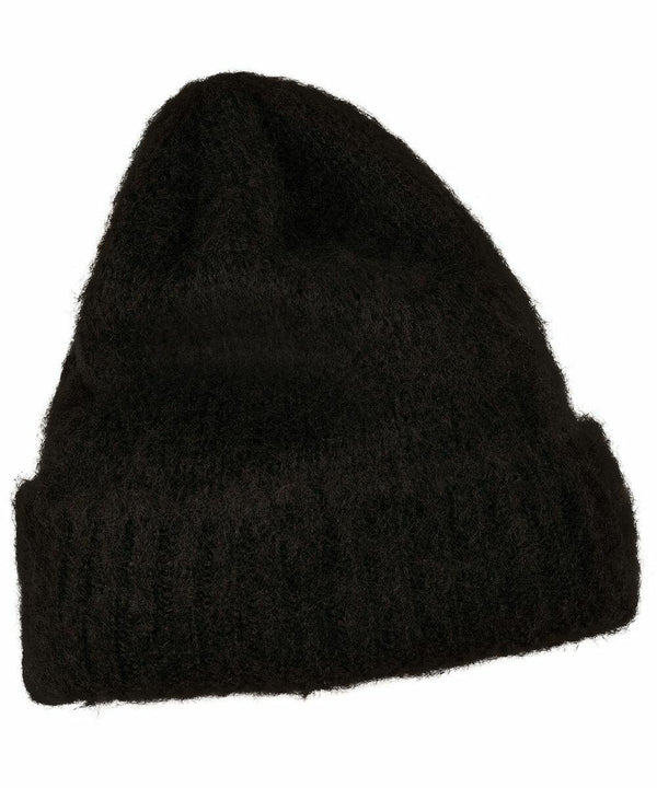 A Flexfit By Yupoong YP155 black knit beanie with a folded rim is shown on a plain white background.