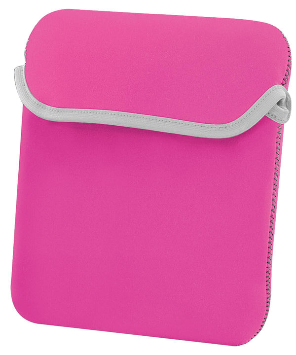 A bright pink tablet sleeve with a flap closure and gray trim is pictured. The Bagbase BG358 sleeve appears to be made of a soft, neoprene-like material and features stitched edges for durability.