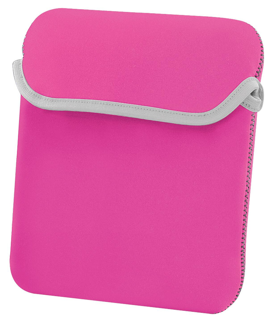 A bright pink tablet sleeve with a flap closure and gray trim is pictured. The Bagbase BG358 sleeve appears to be made of a soft, neoprene-like material and features stitched edges for durability.