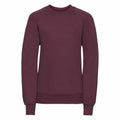 Introducing the Russell 7620B: a simple yet stylish plain maroon sweatshirt featuring long sleeves and a classic crew neckline. The soft fabric ensures comfort, while ribbed cuffs and hem complete the elegant design.