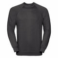 A Russell brand 7620M black long-sleeved sweatshirt featuring a crew neckline, displayed on a plain background.
