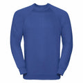 A Russell 7620M sweatshirt, featuring a plain blue color with long sleeves and a crew neck, showcased against a white background.
