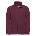 Introducing the Russell 8700B: a maroon fleece jacket featuring a full front zipper and a high collar. This stylish jacket comes with long sleeves and includes two convenient side pockets.