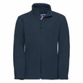 The Russell 8700B dark blue fleece jacket features a high collar and a front zipper, displayed against a white background.