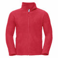 The Russell 8700M is a vivid red fleece jacket, boasting a full front zipper and long sleeves. It comes with a high collar and two side pockets equipped with zipper closures, while the fabric offers a soft, plush texture.