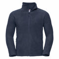 The Russell 8700M is a navy blue fleece jacket featuring a high collar, front zipper, long sleeves, and zippered pockets on each side.