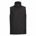 Russell's 8720M is a black fleece vest with a high collar and front zipper, featuring two zippered side pockets.