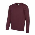 AC001 by AWDis Academy, a maroon crewneck sweatshirt featuring long sleeves, presented against a plain white background.