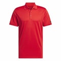 The AD002 by adidas is a red short-sleeve polo shirt featuring a collar and three buttons. The fabric has a smooth appearance, and there's a small black logo on the left sleeve. The shirt is presented on a white background.