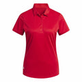 Product AD003 from adidas, a red short-sleeve polo shirt featuring a collar and buttoned placket, displayed on a plain white background.