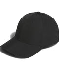 The Caps product is a plain black baseball cap with a curved brim, visible stitching on the peak and panels, and two small ventilation holes on each side. It is shown against a white background.