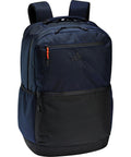 The adidas Bags rucksack features navy blue and black colours, padded shoulder straps, a front zip pocket, a smaller top pocket with an orange pull, side pockets, and displays the adidas logo on the front.