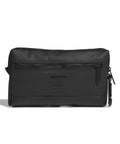 A black rectangular zippered bag with a front zip pocket, small side loop, and embossed Adidas logo on the front.