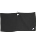 A black rectangular Adidas towel with white trim, a small hanging loop at the top centre, and the logo in the bottom right.