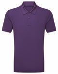 The Asquith & Fox AQ002 is a simple, classic polo shirt in a plain purple color, featuring short sleeves and a collar. It includes a buttoned placket with three buttons, and the fabric has a smooth and lightweight texture.