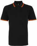 Asquith & Fox's AQ011 polo shirt in black, featuring an orange striped collar and sleeves.