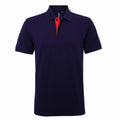 Introducing the AQ012 from Asquith & Fox: This navy blue polo shirt features a button-up collar and a striking red placket. Its timeless and understated design makes it ideal for both casual and semi-formal occasions.