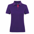 The Asquith & Fox AQ022 is a purple short-sleeved polo shirt with a pink accent inside the collar area. It includes a three-button placket and features a traditional collar.