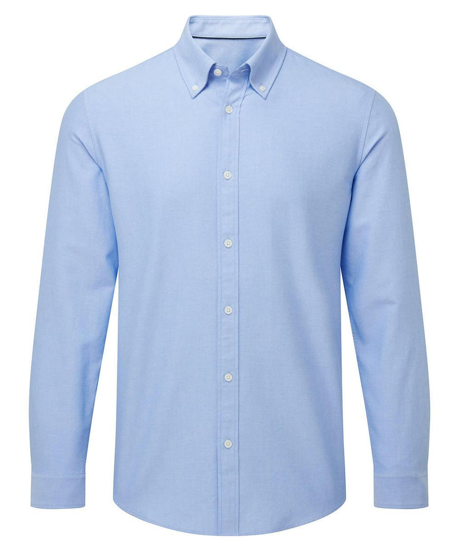 A light blue, long-sleeve button-up shirt from Shirts, featuring a button-down collar and white buttons on the front and collar points, displayed against a white background.