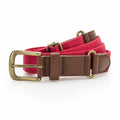 The Asquith & Fox AQ902, a red canvas belt with a brown leather buckle and brass hardware, is neatly coiled.