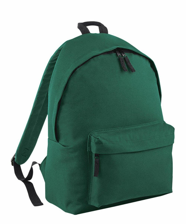 A Bagbase B125J with black zippers and a front pocket. The Bagbase has two shoulder straps and a carrying handle at the top. The design is simple and functional, suitable for school, travel, or everyday use.