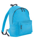 The Bagbase B125J is a bright blue backpack featuring black zippers, a front pocket, adjustable shoulder straps, and a convenient carrying handle on top.