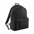 The Bagbase B125L, featuring a front zippered pocket and adjustable shoulder straps, is displayed against a white background.