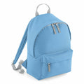 The Bagbase B125S is a light blue backpack featuring two zippered compartments and adjustable gray straps, along with a small carrying handle on top.