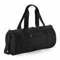 The Bagbase B140L is a black duffel bag featuring two shoulder straps, a side strap, and a front zipper pocket.