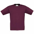 Against a white background, the B150B T-shirt from B&C Collection is showcased as a plain maroon short-sleeve shirt with a simple design, free of any logos or patterns.