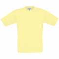 A plain, light yellow B&C Collection B150B T-shirt displayed against a white background. The shirt features a round neckline and short sleeves, with a slightly visible label in the neck area.