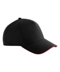 Caps: A black baseball cap with a curved brim, small ventilation holes on the sides, and a thin red accent line along the brim edge. Displayed on a plain white background.