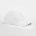 A plain white Beechfield B172R baseball cap on a white background, viewed from a slight angle. The cap features six panels, a curved brim, and an adjustable strap at the back.