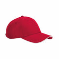 The B195R by Beechfield is a red baseball cap featuring a curved brim with white trim along the edge, complete with ventilation holes and a button on top.