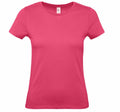 A plain pink women's short-sleeve t-shirt from B&C Collection's B210F line is displayed on a white background. It features a crew neck and appears to have a smooth, fitted fabric.