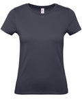 A plain, dark gray short-sleeve t-shirt from the B&C Collection, product name B210F, is displayed against a white background. The t-shirt features a round neckline and appears to be made of cotton fabric. It is neatly aligned and unfitted.
