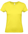 The B210F T-shirt by B&C Collection is displayed against a white background. This shirt features short sleeves and a rounded neckline, highlighting its simple, classic design in bright yellow.