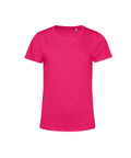 A T-shirt product in bright pink with short sleeves and a plain design is shown on a white background.