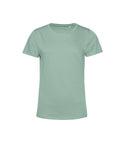 A light sage green, short-sleeved crew neck T-shirt is shown against a white background.