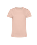 A plain, light pink T-shirt short-sleeved tee with a classic crew neckline and simple design is shown on a white background.