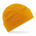 Beechfield B243R beanie hat in yellow featuring a wide folded brim.