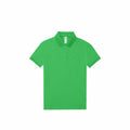 B261F by B&C Collection, a green polo shirt featuring a collar and short sleeves, is displayed flat against a plain background.