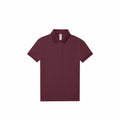A maroon short-sleeve B261F polo shirt by B&C Collection, featuring a collar and button placket, laid flat on a white background.