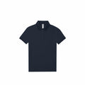 A plain black polo shirt featuring short sleeves and a collar from the B&C Collection, identified by the product name B261F, is displayed against a white background.