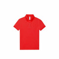 A bright red B&C Collection B261F polo shirt featuring short sleeves and a buttoned collar is centered against a plain white background.