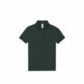 B&C Collection's product B263F, a dark green short-sleeve polo shirt featuring a collar and three buttons, laid flat on a white background.