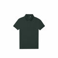 The B&C Collection B265F is a plain dark green polo shirt featuring a collar and short sleeves, displayed laid flat on a white background.