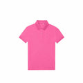 A B265F from B&C Collection, a pink polo shirt featuring a collar and three buttons, displayed on a white background.