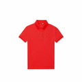 A vibrant red B265F polo shirt by B&C Collection, featuring short sleeves and a classic collar, showcased against a simple white background.